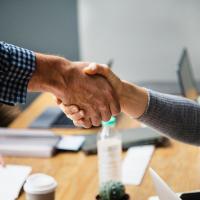 Shaking Hands at Meeting