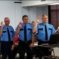 Waupun fire command staff raising hand to take oath of higher offices