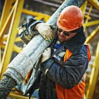 Worker Pouring Concrete