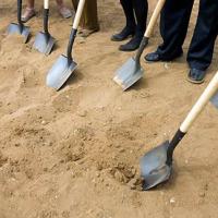 shovels digging dirt