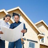 new homeowners looking at house