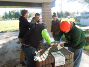 Students working on unpacking road. 