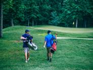 people golfing 