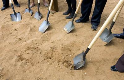 shovels digging dirt
