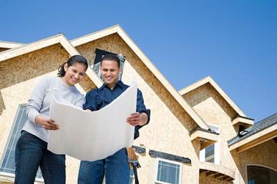 new homeowners looking at house